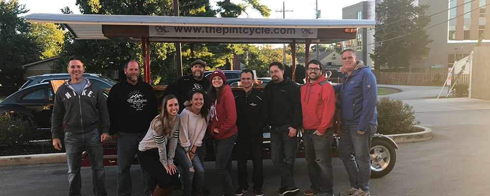 Weihe Employees enjoy some time outside of the office at The Pint Cycle tour